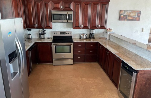 Bottle Creek Villa | Waterfront Villa 3 bedroom main house &1 bed guesthouse with compact rental car