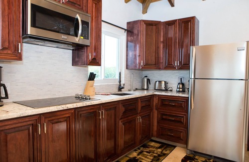 Bottle Creek Villa | Waterfront Villa 3 bedroom main house &1 bed guesthouse with compact rental car