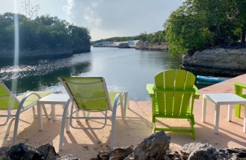 Discovery Bay Villa | Waterfront Villa with Dockside Patio, Paddleboards & Pontoon Boat Rental option