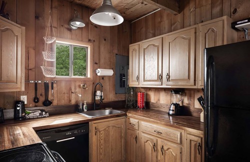 Great Cacapon Cabin | Waterfront w/Hot Tub, Fire Pit, Deck & Water Toys!