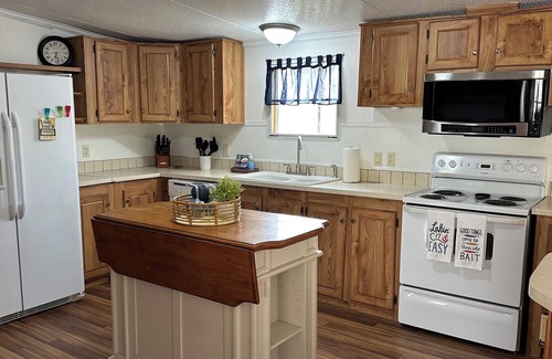 Negreet House | Waterfront with private dock ,boat ramp, paddle boats and Kayaks!nJust Listed!
