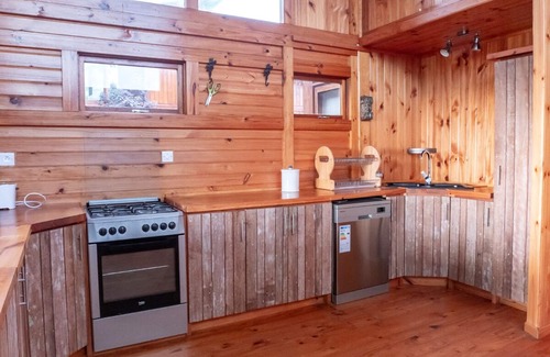 La Preneuse Ski Chalet | Waterfront wooden chalet overlooking the turquoise lagoon