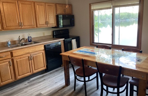Richwood Cabin | Waters Edge - Year Round 4 Bedroom Lakehome with Pontoon and Sandy Beach.