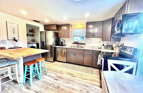 Saint James City Cottage | Waterside Cottage: Newly Renovated on canal w 26’ boat dock!