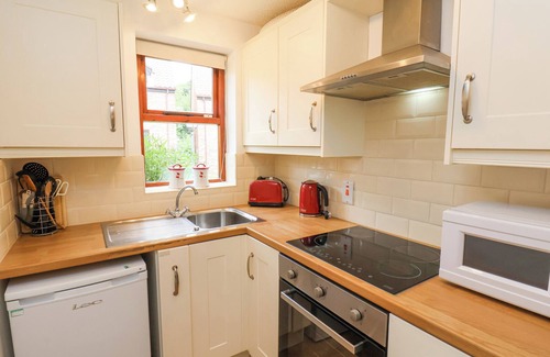 Whitby Cottage | WATERSIDE COTTAGE, pet friendly, with a garden in Whitby