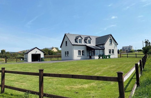 Waterville House | Waterville Luxury: 4BR Retreat Steps from Beach, Golf & Scenic Views