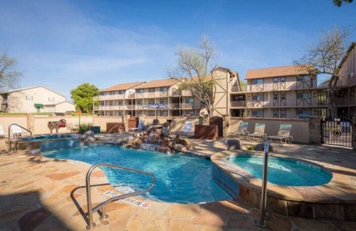 New Braunfels Condo | Waterwheel Escape - River access+2pools+4 hot tubs