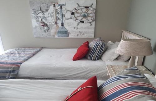 Trafalgar Apartment | Waves of Mercy