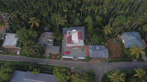 Sulthan Bathery Apartment | Wayanadan Huts Homestay