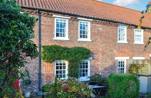 Hunmanby Cottage | We love the courtyard location of this historic cottage.