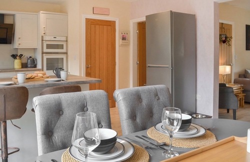 Langtoft Cottage | We love the open plan living area with wood burner.