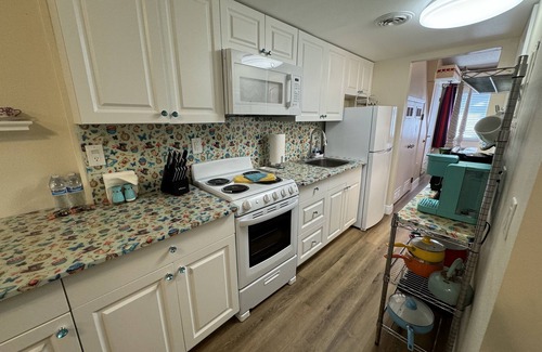 Paradise Lakes Condo | We're All Mad Here D-4 in Paradise Lakes NUDIST Community for Adults 30+