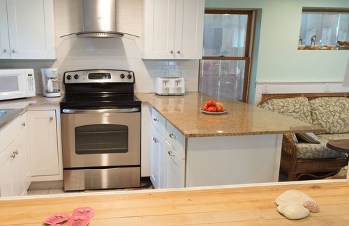 Beach Haven Cottage | Weekly and Monthly Rental Available in Cozy, Backyard Cottage