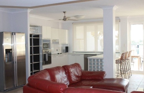 Cardwell House | Welcome to 'Hinchinbrook Escape' Waterfront Townhouse with Marina Berth Pool Spa