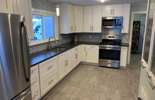 Indian River House | Welcome to Maison Bleu…just 200 steps away from the waters edge of Burt Lake!