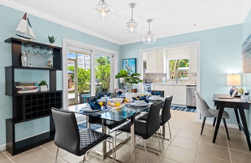 Poinsettia Heights House | Welcome to Pelican Landing, A Cozy Tropical Heated Pool Home!