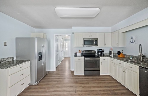 Cottage Line House | Welcome to the Captain's Quarters, a 4 BR luxury furnished monthly rental.