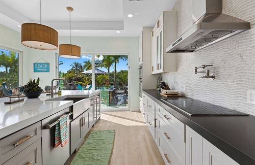 Coral Shores House | Welcome to the Bahama Breeze, A Sunny Waterfront Heated Pool Home!