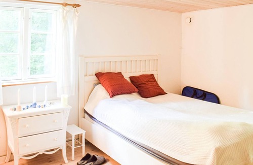 Andrarum House | Welcome to this pretty wooden house.