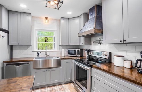 Winchester House | Welcome to Tims Ford Lake! Free UTV/kayaks/canoe, firepit, complete privacy!