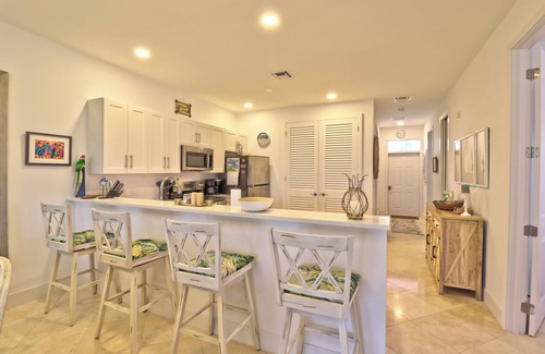 Treasure Cay Condo | Welcome to "Treasure Pleasure" Bahama Beach Club 4 bedroom, Beachfront Condo