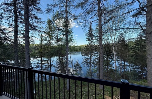 Riviere-Rouge Ski Chalet | Welcome to your haven of peace, a magnificent chalet nestled in the heart of nature.