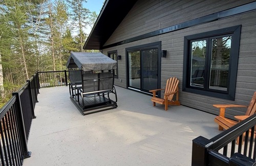 Riviere-Rouge Ski Chalet | Welcome to your haven of peace, a magnificent chalet nestled in the heart of nature.
