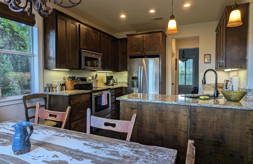 Leander House | Welcoming home overlooking lake with forested hill country views