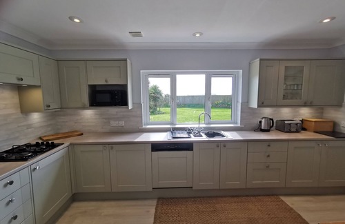 Carnhedryn House | Well presented 3 bedroomed dormer bungalow with parking, garden and view