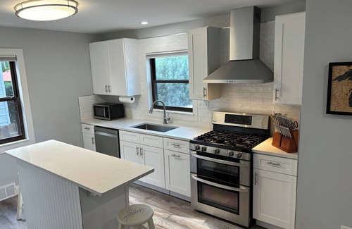 Kamm's Corners House | West Park retreat luxury salt water hot tub and heated fiberglass inground pool