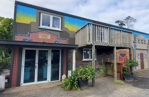 Coromandel House | Western Theme Mural,Private,Unique,Rustic,Sea Views,Sunsets,Bush,Pet friendly.
