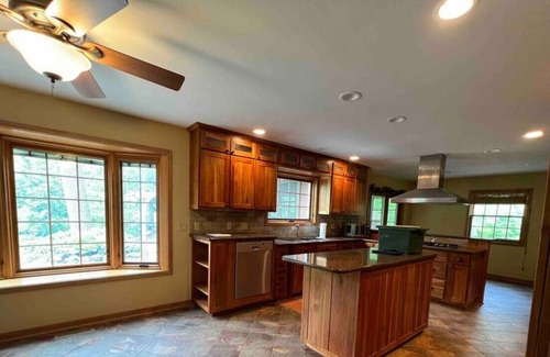 Dane County House | Where cabin coziness meets near-city living convenience.