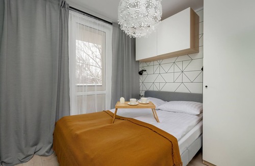 Brynow Apartment | White and Green Apartment by Renters