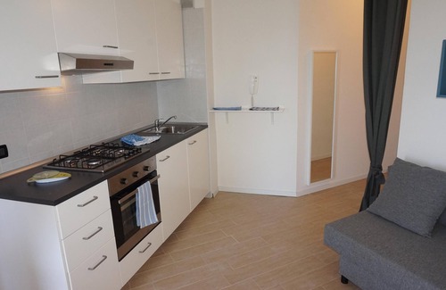 Lignano Sabbiadoro Apartment | White Black - Large one room apartment