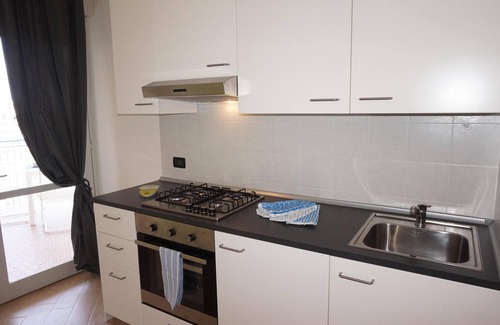 Lignano Sabbiadoro Apartment | White Black - Large one room apartment