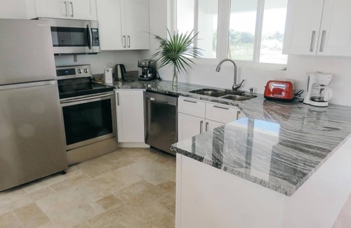 Port Howe House | White Ocean Coral - Private Beach Villa