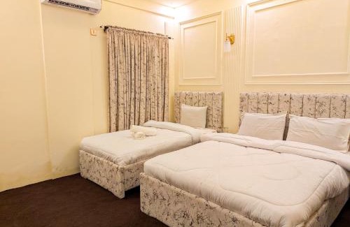 Gulshan-E-Jamal Bed & Breakfast | White Rose BNB - Airport Branch Karachi