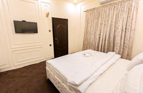 Gulshan-E-Jamal Bed & Breakfast | White Rose BNB - Airport Branch Karachi