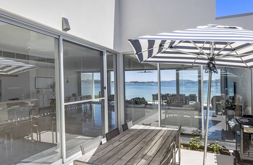Corlette House | Whitehouse On The Water - Palatial Home on Idyllic Beach
