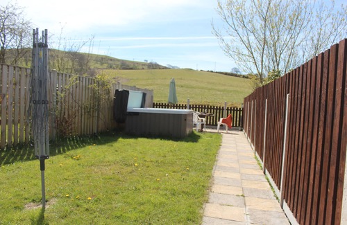 Tregaron House | Whole house sleeps 5, private garden with hot-tub, pet friendly.