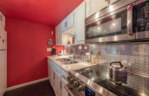 Thayerville Condo | Will O' The Wisp 307C: Lakefront One Bedroom Condo with Exotic Flair, Fireplace,