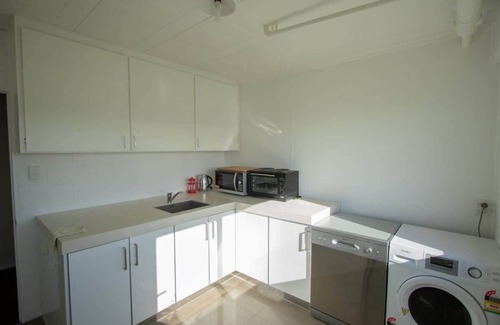 Bell Block Apartment | Wills On The Water - beachfront apartment