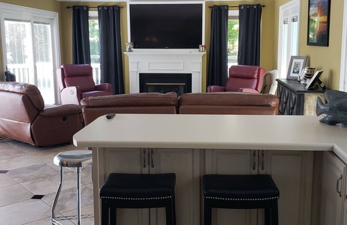 Florence House | Wilson Lake House. Boatlift underneath living room.