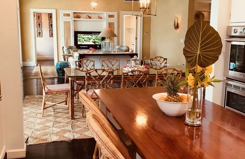 Dunmore Town Villa | Wind Whistle Harbour Villa- a classic Bahamian 2.5 story veranda-style house.