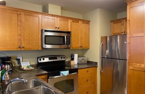 Golden Condo | Windfall Lodge: 2-bedroom condo with hot tub and mountain views