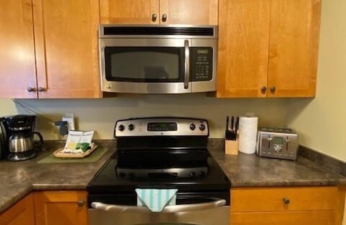 Golden Condo | Windfall Lodge: 2-bedroom condo with hot tub and mountain views