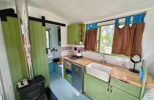 Napier Cabin | WindHorse Shepherds Hut situated on our rustic eco equestrian small holding.