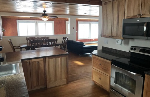 Alton Bay House | Winnipesaukee lakefront house includes slip, deck, hot tub & sleeps up to 11
