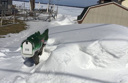 Cadillac House | Winter fun! Ice fishing, skiing, snowboarding or just relax by the fireplace!