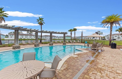 Thomas Drive House | Winter rental rates available! Close to Publix Sports Park! Community Pool!